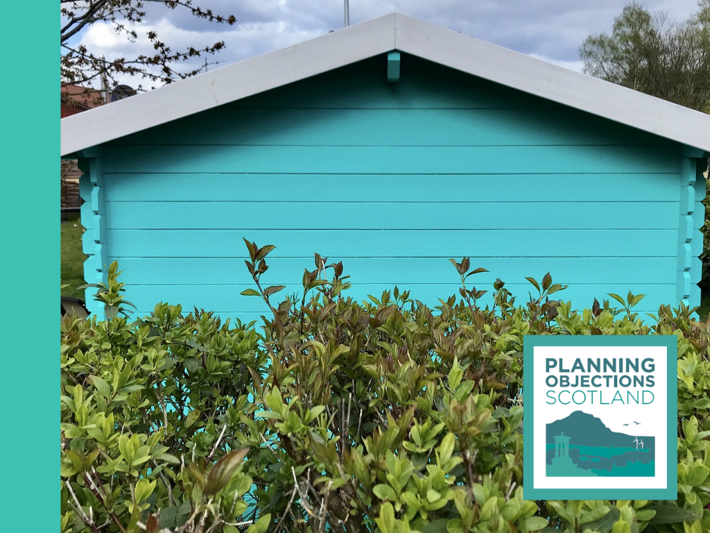 Large outbuilding located in a garden setting with a planning objection low